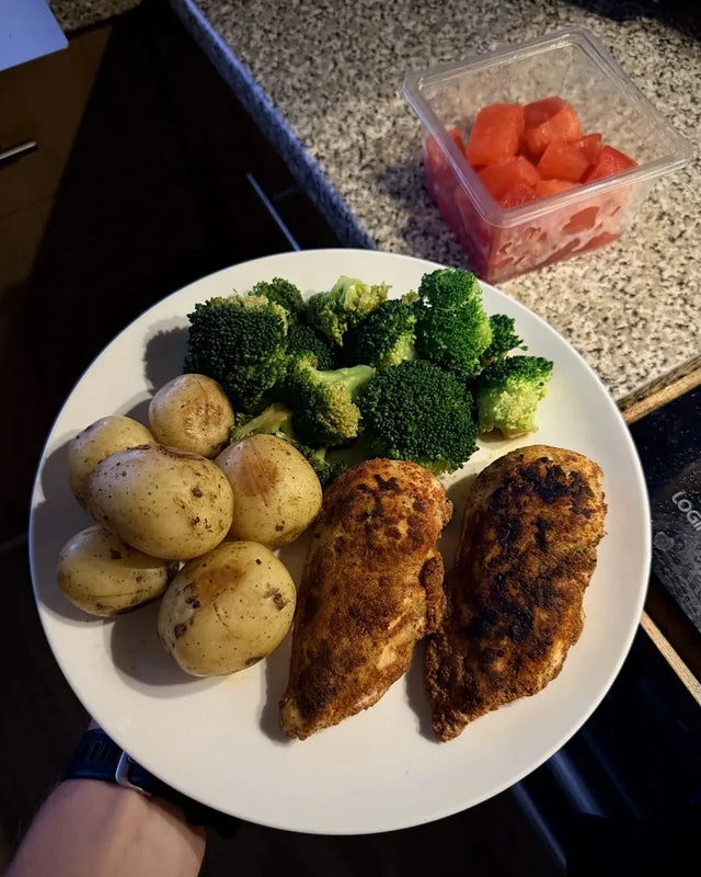 A chicken, potato and broccoli plate